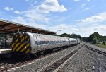 Amtrak Shuttle Train # 464, enroute from New Haven to Springfield, approaches the depot with Ex-Metroliner Cab Car # 9647 in the lead. 